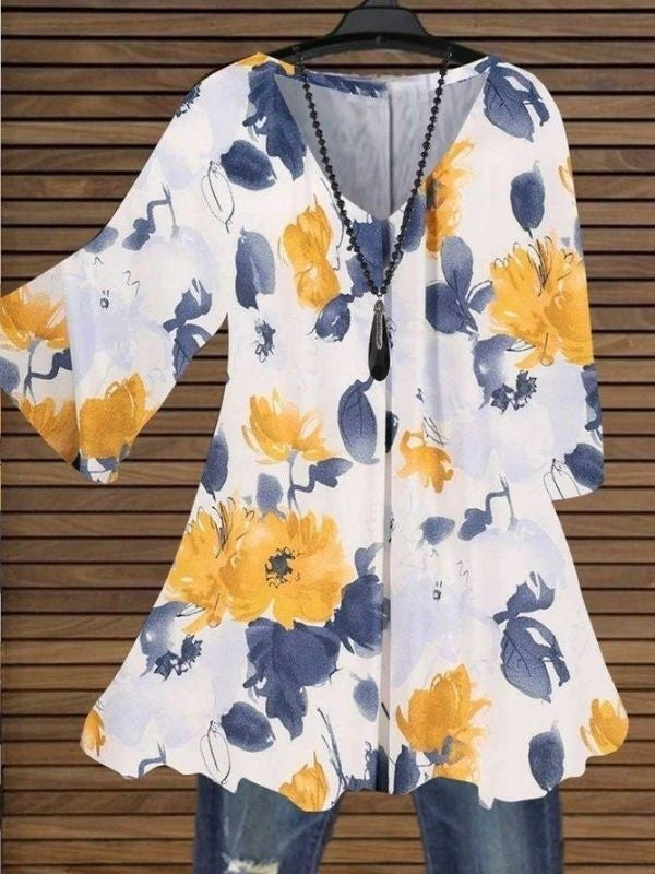 Damestop met 3/4 mouwen en bloemenprint - Vrijblijvend  & stijlvolle blouse voor elk seizoen